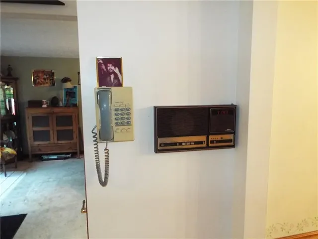 a view of a livingroom with furniture and a flat screen tv