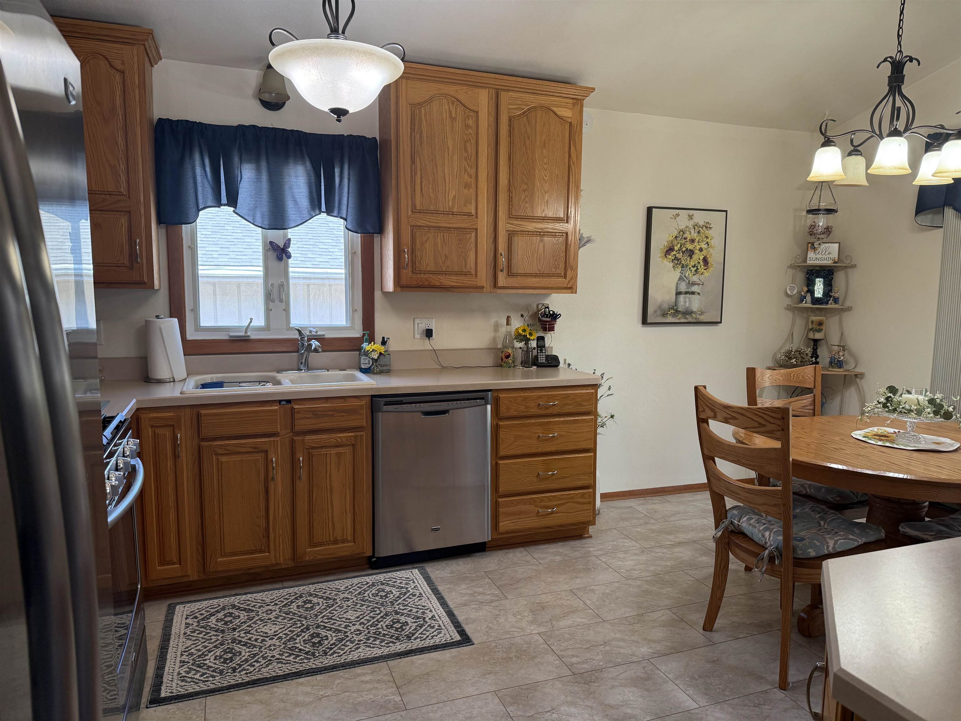 2822 Norway Pine Road Rockford, IL 61109 - Photo 3 of 18 a kitchen with a sink and cabinets
