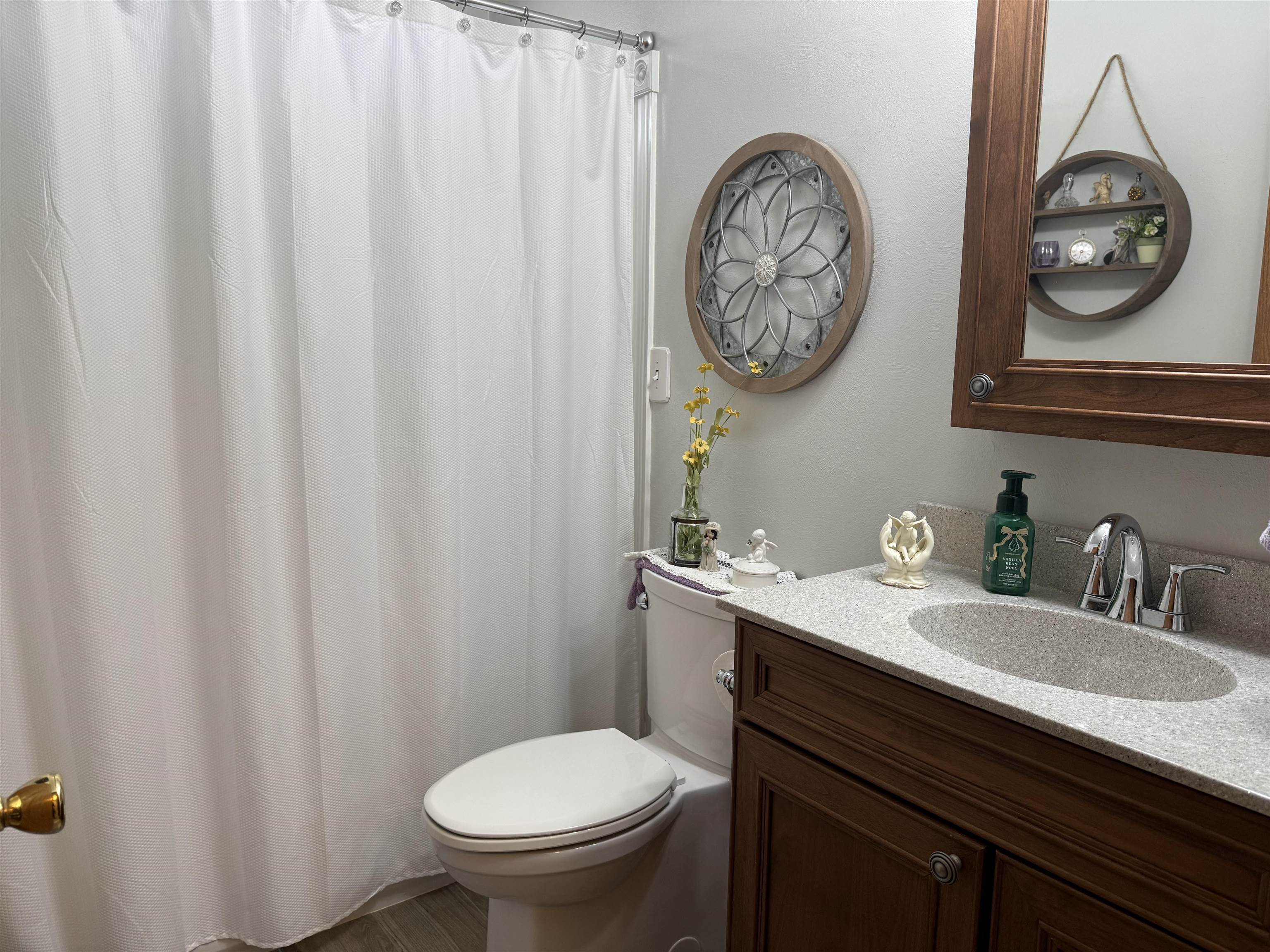 2822 Norway Pine Road Rockford, IL 61109 - Photo 9 of 18 a bathroom with a toilet and a sink