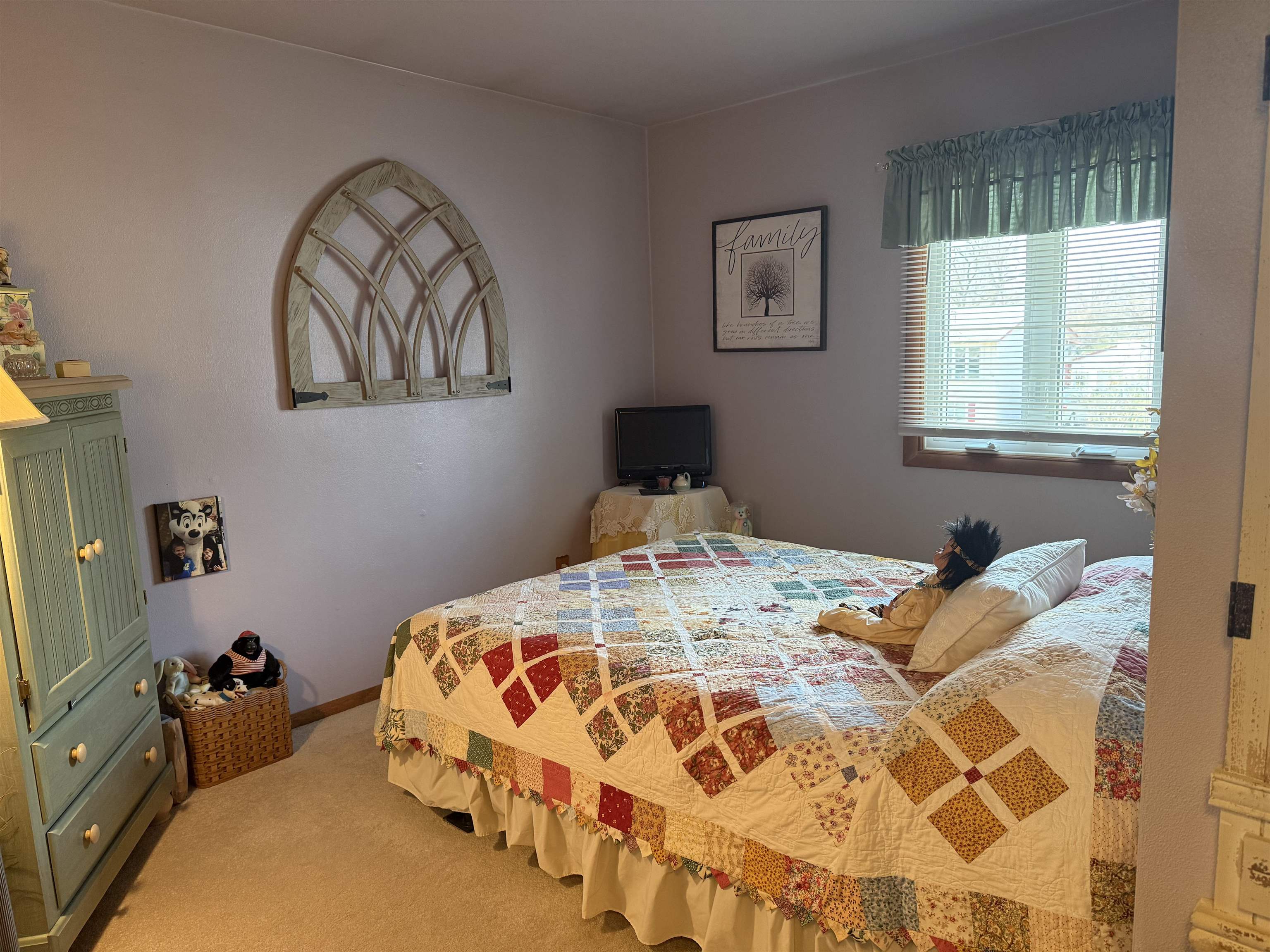 2822 Norway Pine Road Rockford, IL 61109 - Photo 10 of 18 a bedroom with a bed and wooden floor