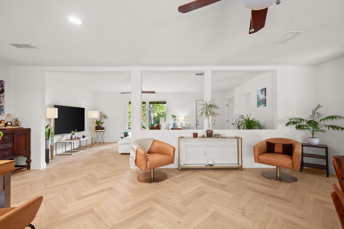 1617 Elmhurst Drive Austin, TX 78741 - Photo 14 of 32 a living room with furniture and a flat screen tv