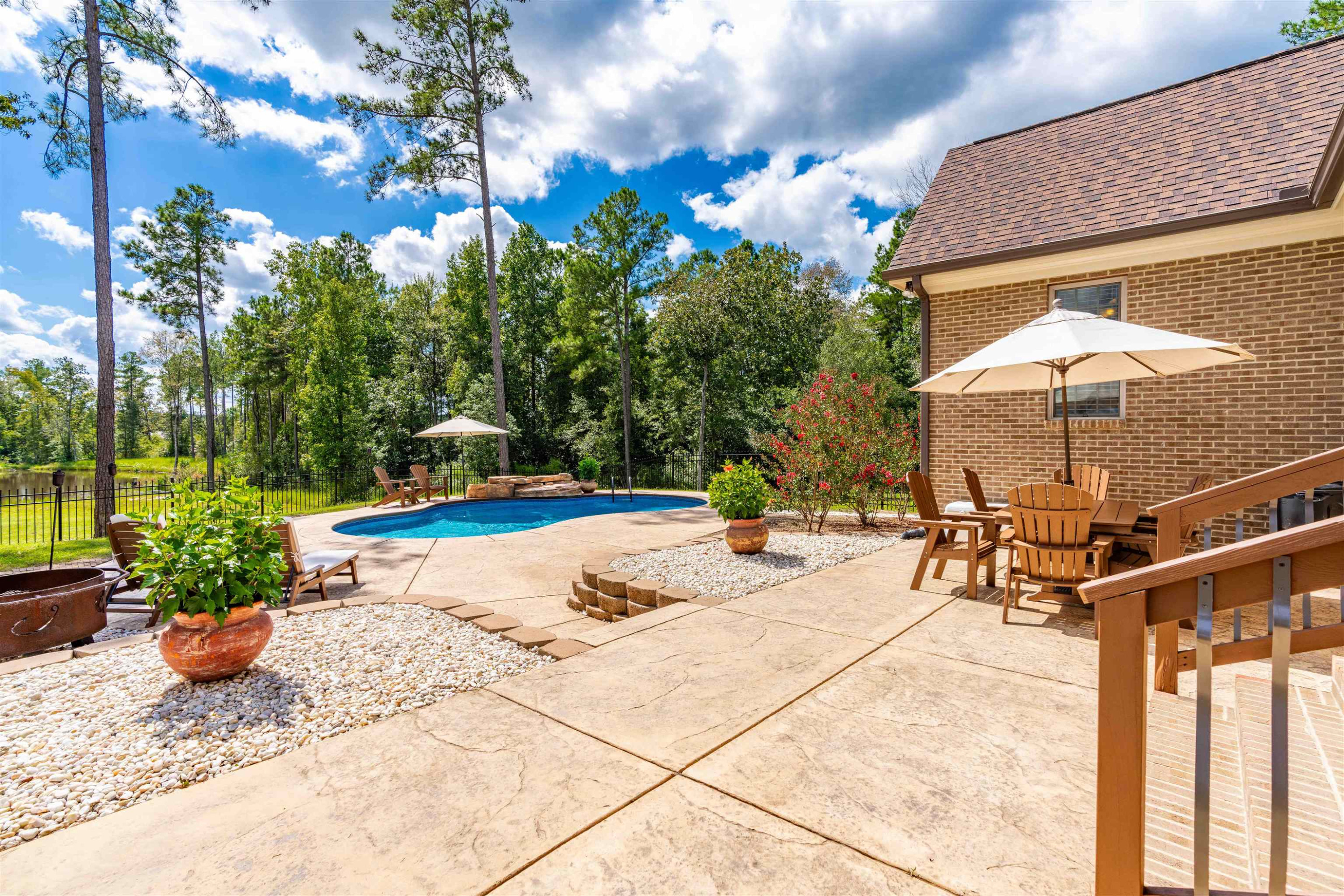 479 Elevation Road Four Oaks, NC 27524 - Photo 43 of 57 Multilevel outdoor entertaining area. Stamped concrete patio. Entertaining Patio