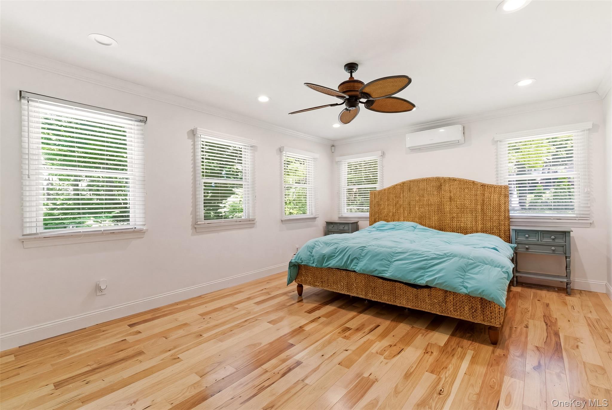 106 Vineyard Road Huntington, NY 11743 - Photo 9 of 25 a bedroom with a bed a dresser and a window