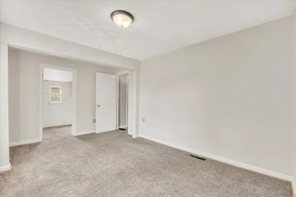 an empty room with an entryway