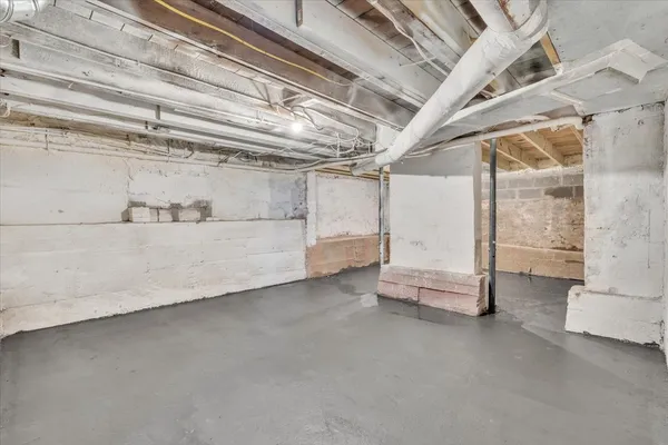 a view of an empty room with a glass door