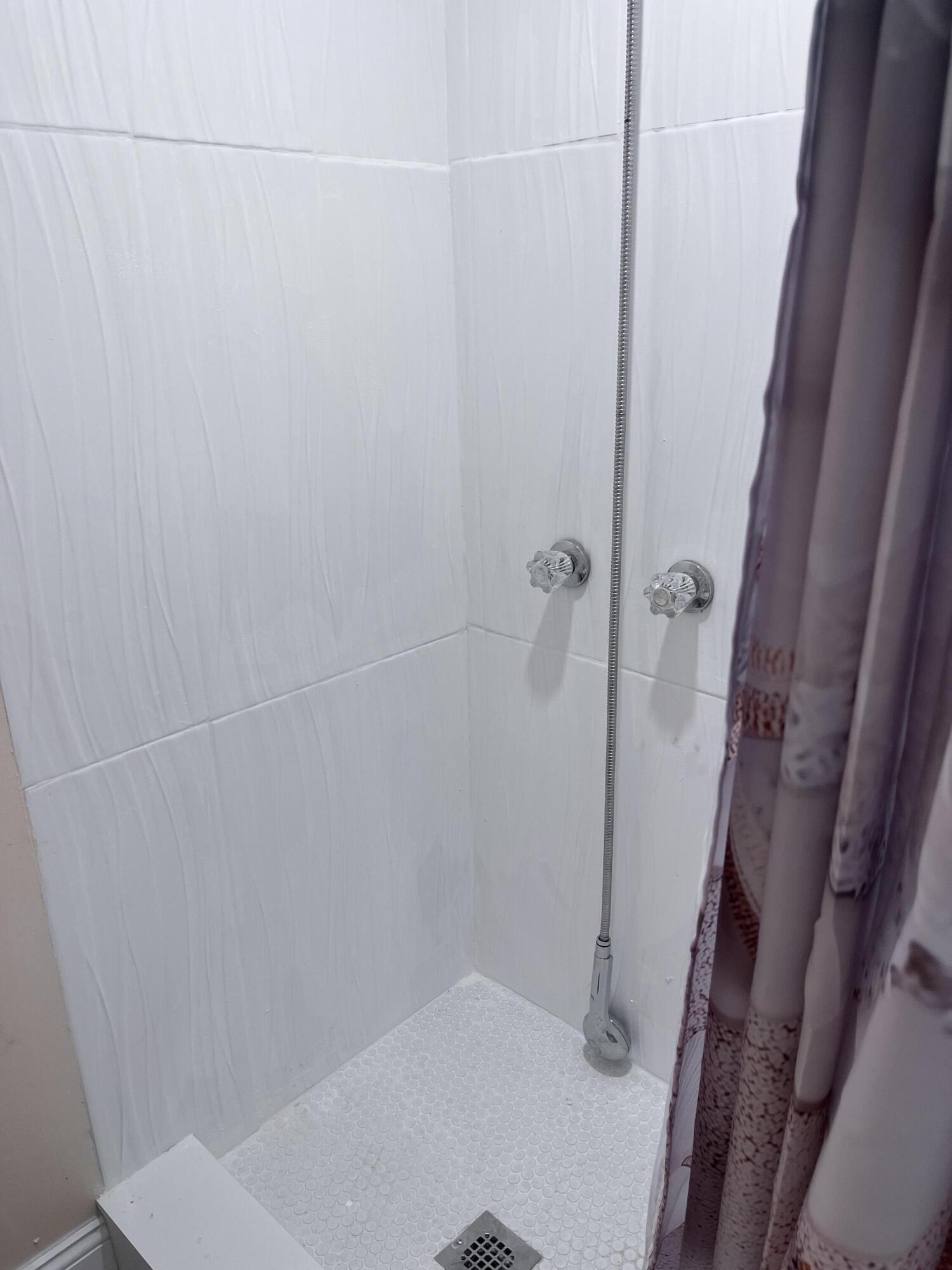 251 South Golf Boulevard, Unit 294 Pompano Beach, FL 33064 - Photo 13 of 36 a bathroom with a shower