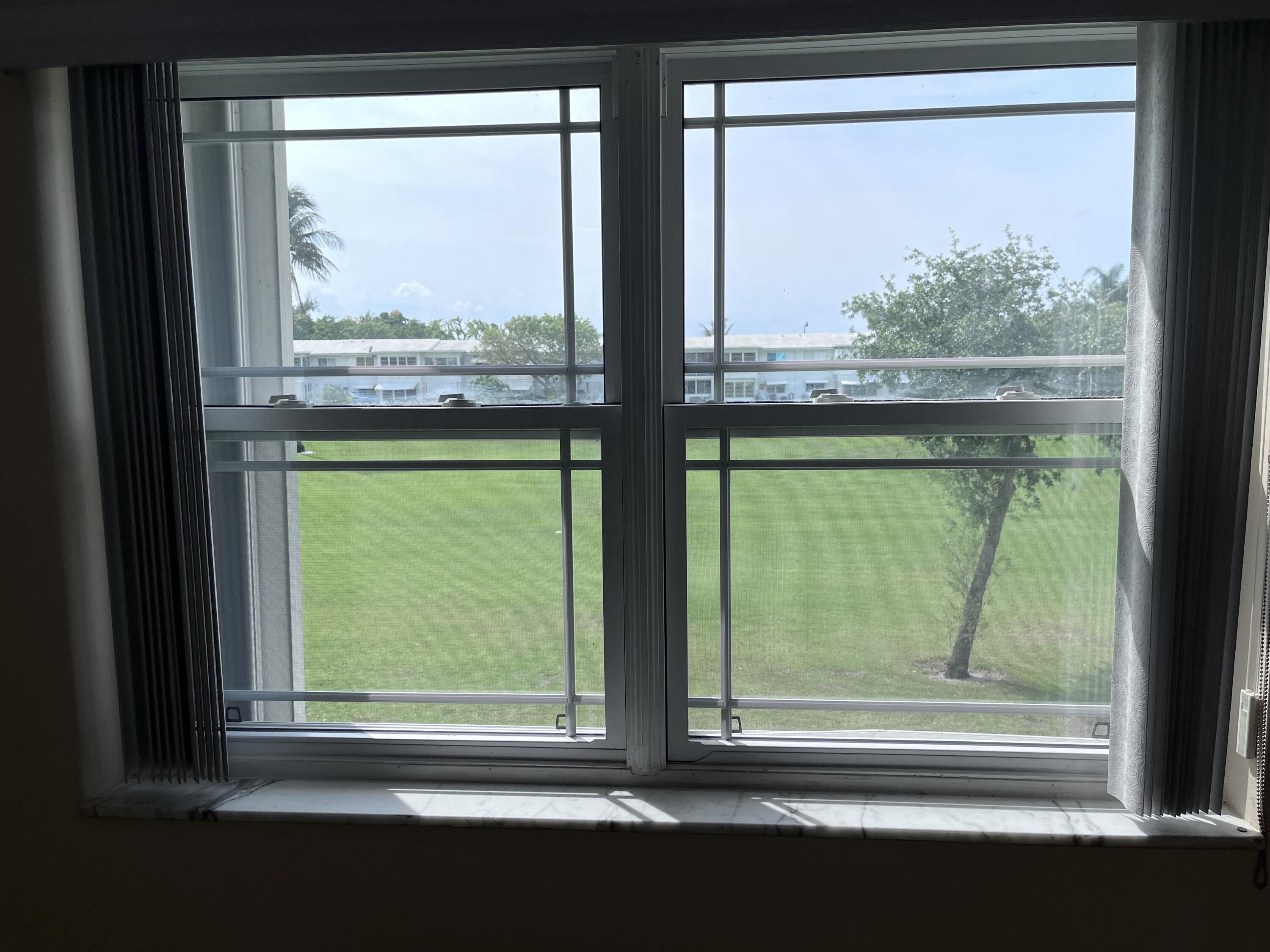 251 South Golf Boulevard, Unit 294 Pompano Beach, FL 33064 - Photo 23 of 36 a view of sky from window