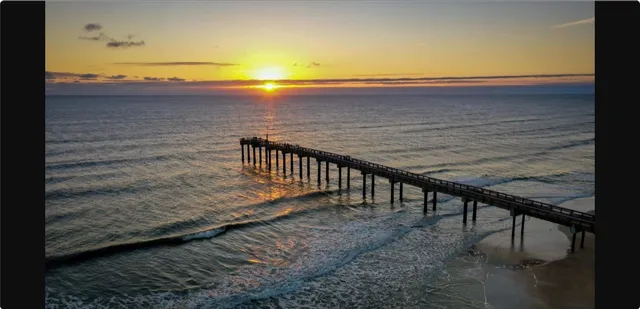 a view of wooden floor with a lake