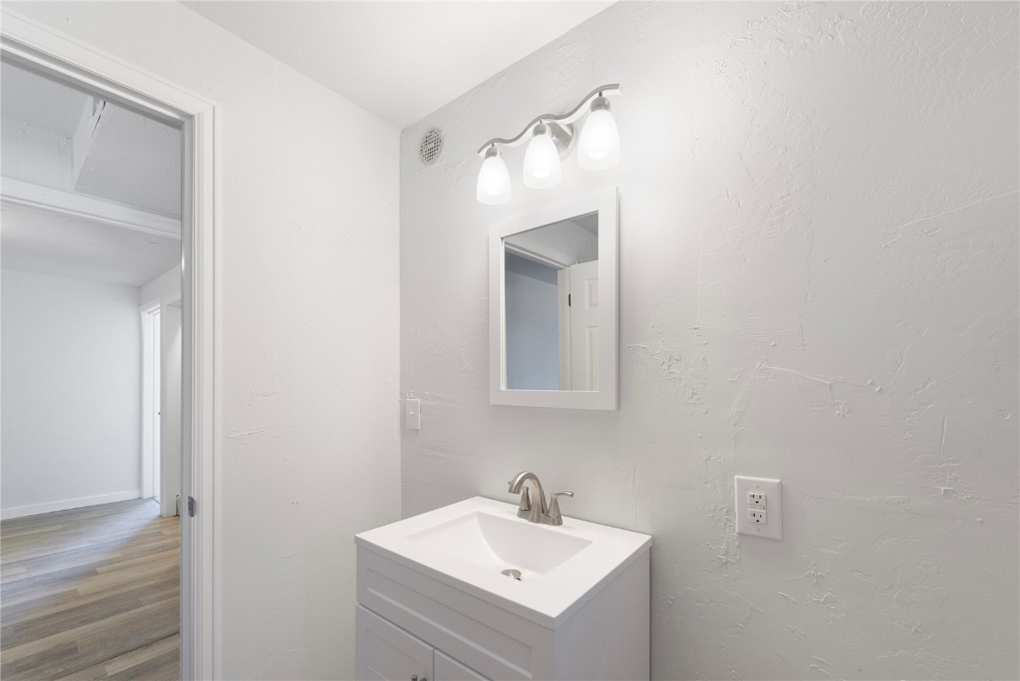 278 Ridge Road Fairplay, CO 80440 - Photo 28 of 50 Lower level Bathroom #2 featuring vanity and hardwood / wood-style floors
