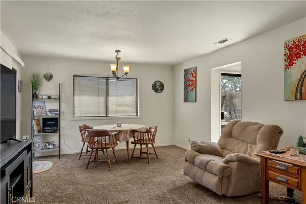 a workspace with furniture and window