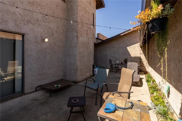 a view of a workspace with furniture