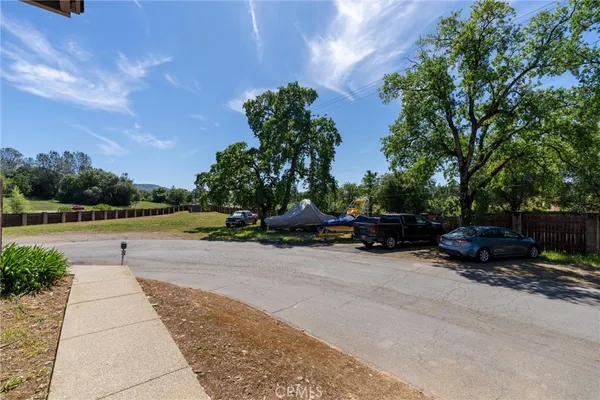 a row of car parked on the side of the road