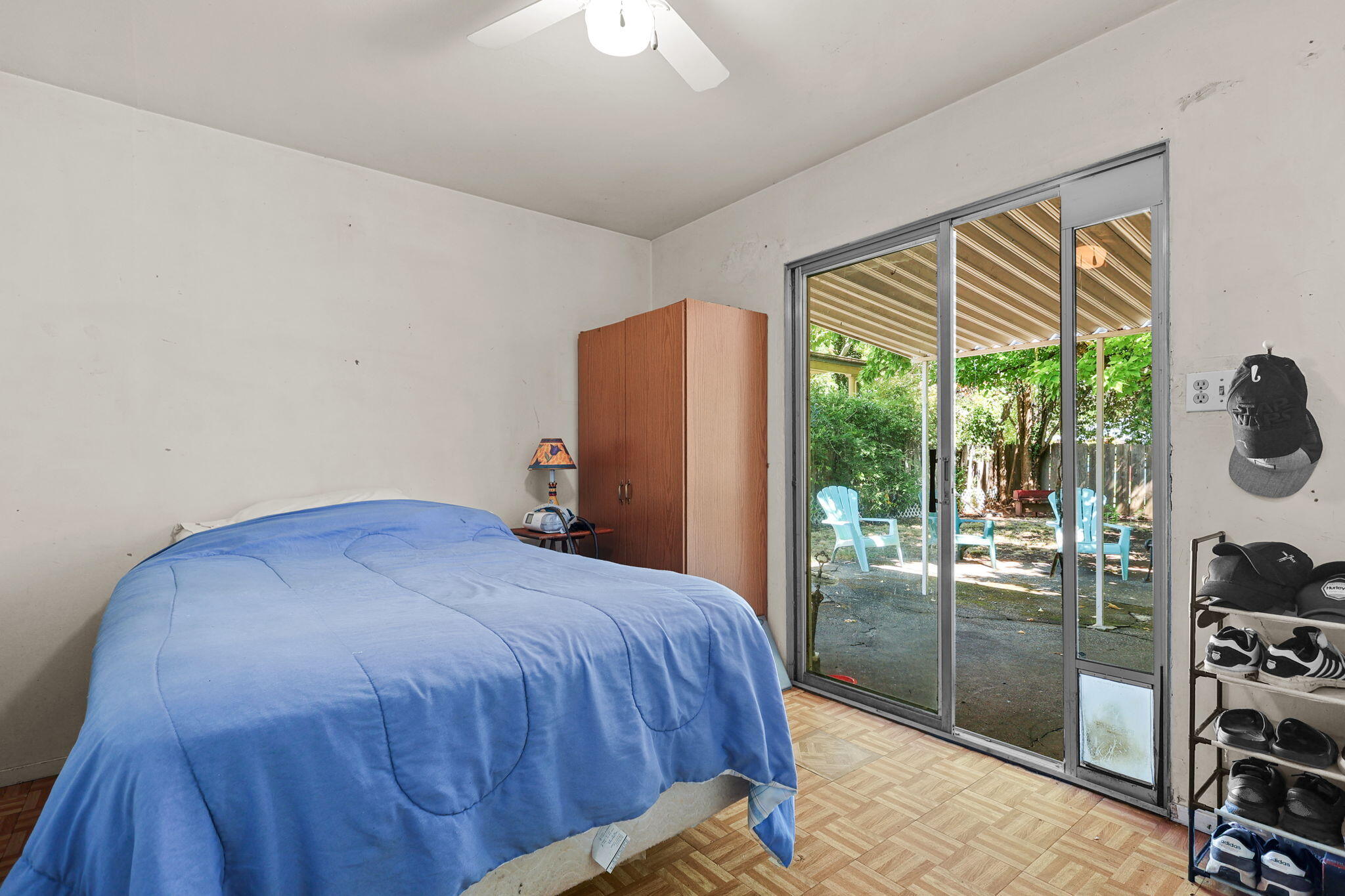 2165 Paris Avenue Redding, CA 96001 - Photo 13 of 22 a bedroom with a bed and large window