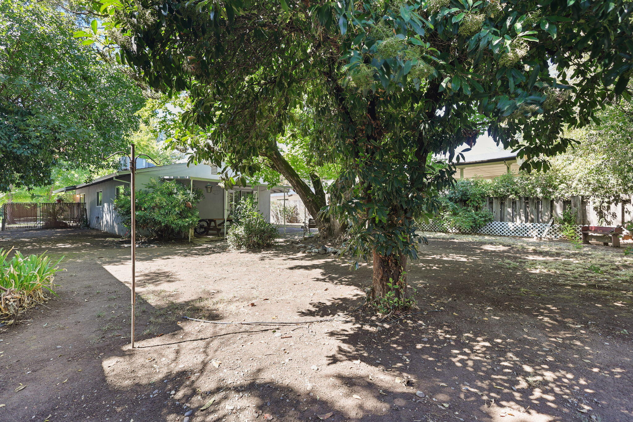 2165 Paris Avenue Redding, CA 96001 - Photo 18 of 22 a view of a house with a yard