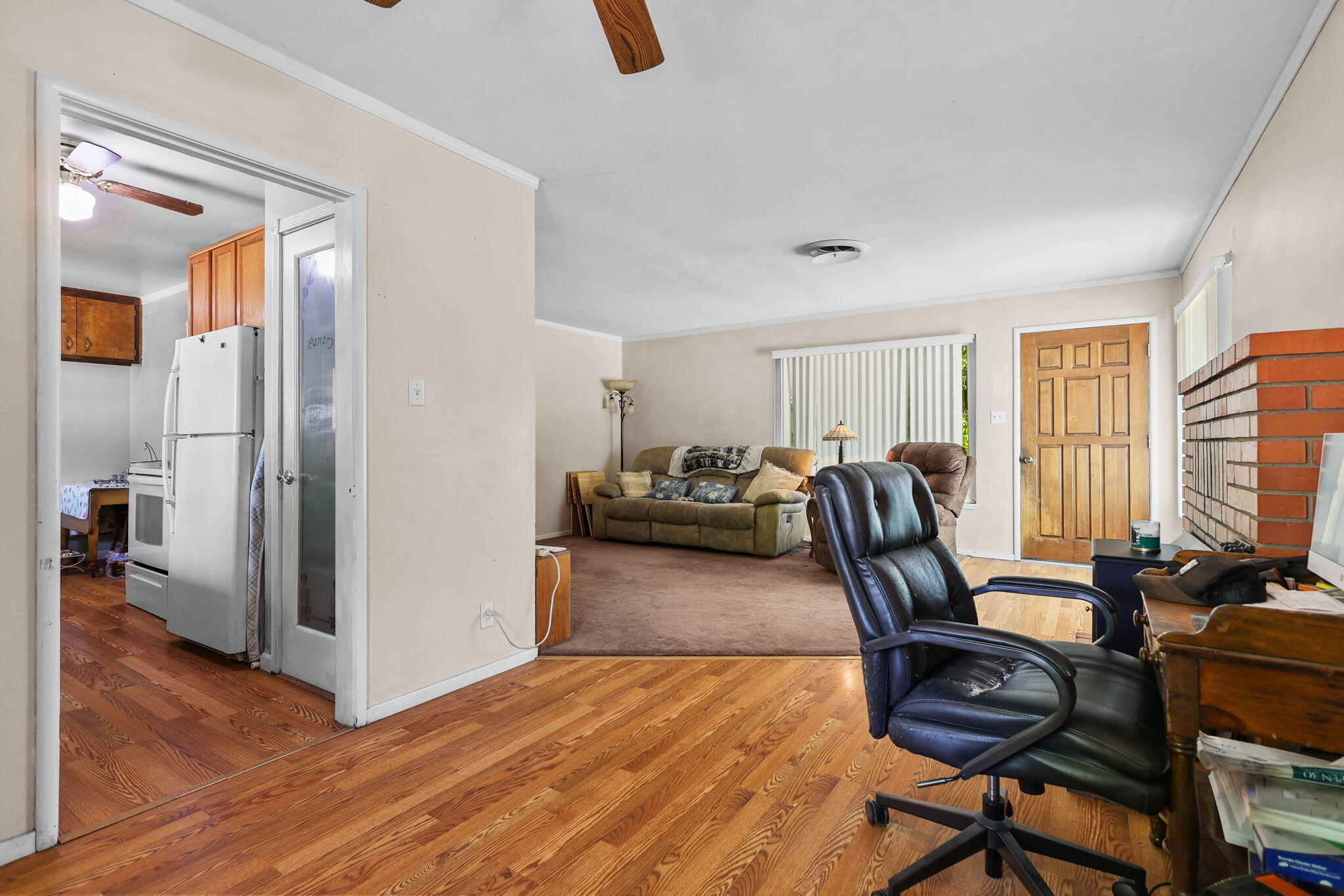 2165 Paris Avenue Redding, CA 96001 - Photo 8 of 22 a view of a workspace with furniture and a window