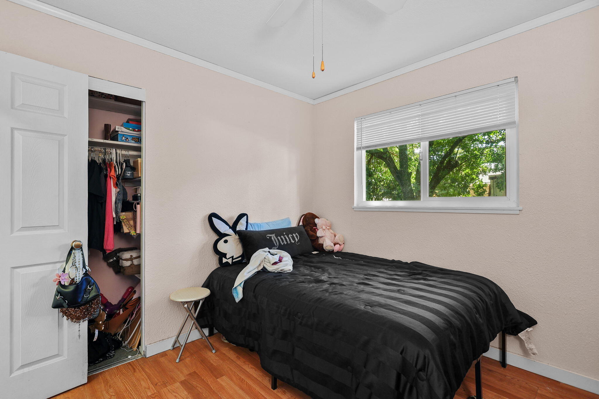 2165 Paris Avenue Redding, CA 96001 - Photo 10 of 22 a bedroom with a bed and a window