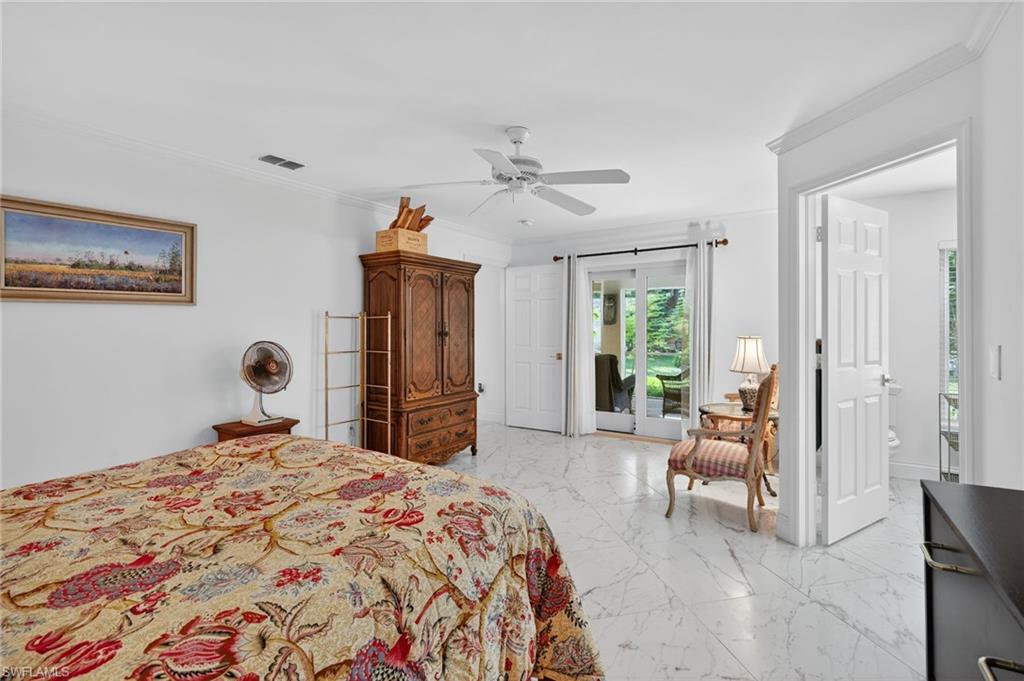 1741 17th Street Southwest Naples, FL 34117 - Photo 26 of 50 Bedroom with ornamental molding, access to exterior, ceiling fan, and light satin finish porcelain tile flooring