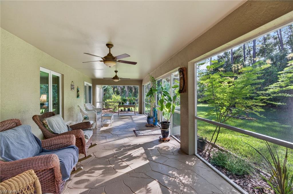 1741 17th Street Southwest Naples, FL 34117 - Photo 39 of 50 View of patio with a sunroom and a ceiling fan