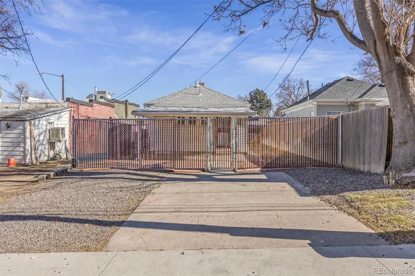 a view of a house with a street