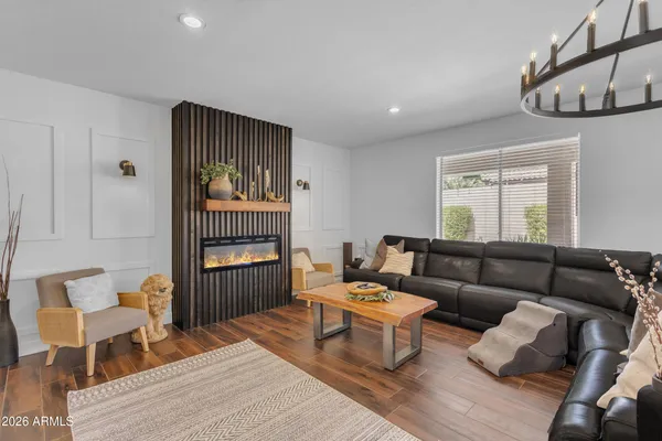 a living room with furniture and a window