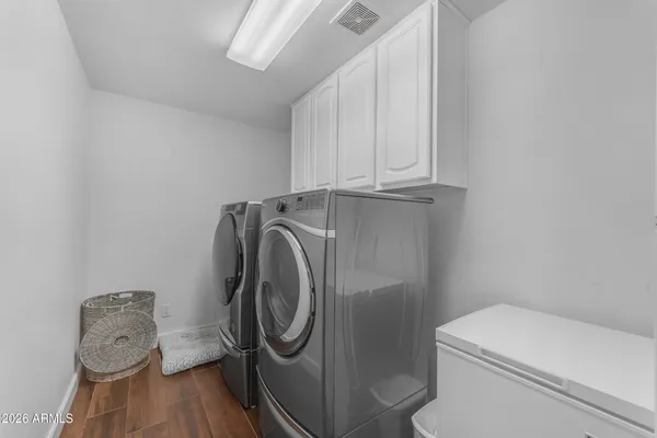 a utility room with dryer and washer