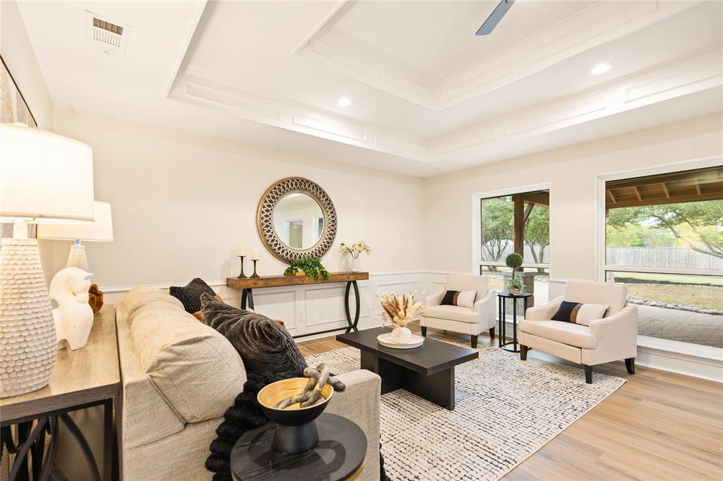 2850 Oak Tree Lane Midlothian, TX 76065 - Photo 11 of 40 a living room with furniture and a large window
