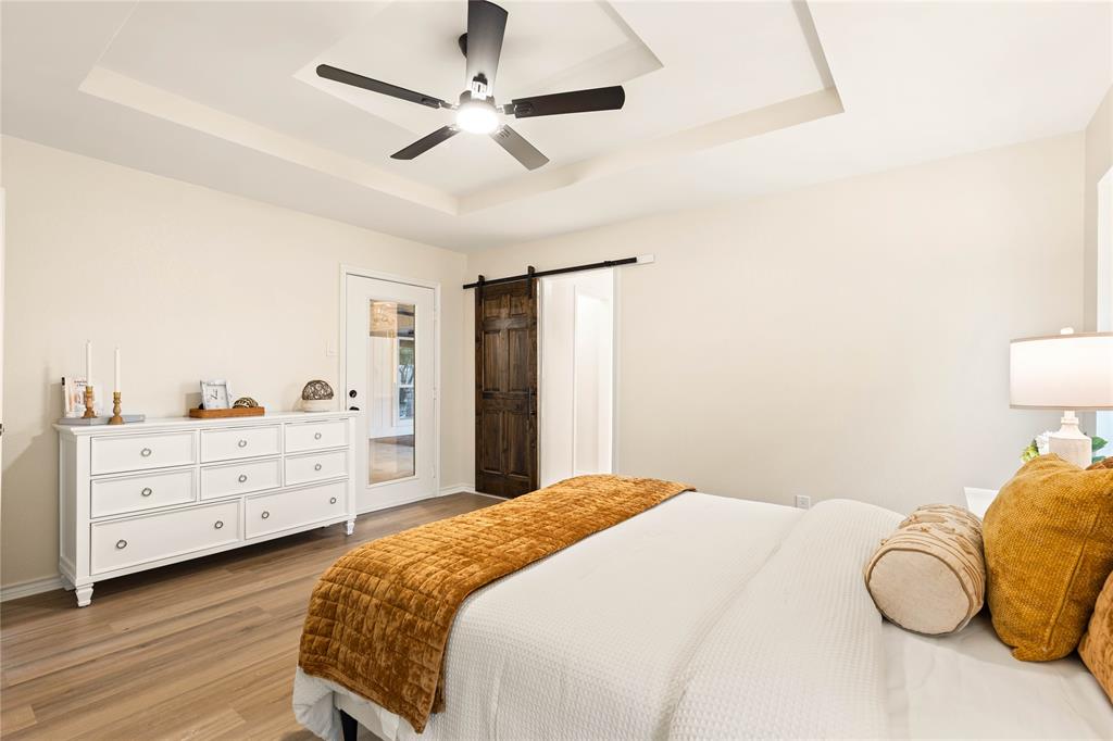 2850 Oak Tree Lane Midlothian, TX 76065 - Photo 16 of 40 a bedroom with a bed and a dresser