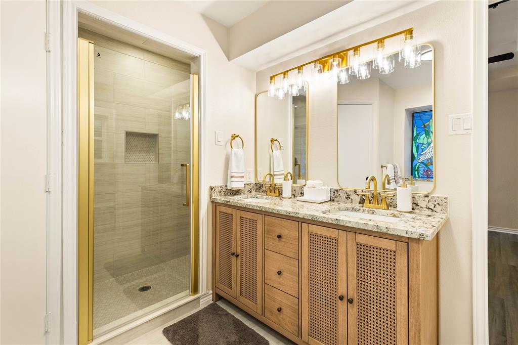 2850 Oak Tree Lane Midlothian, TX 76065 - Photo 20 of 40 a bathroom with a granite countertop sink mirror and double