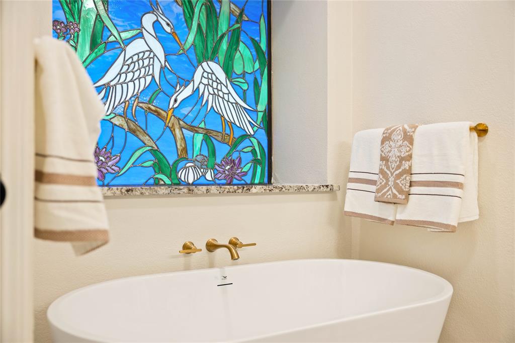 2850 Oak Tree Lane Midlothian, TX 76065 - Photo 21 of 40 a white bath tub with a shower