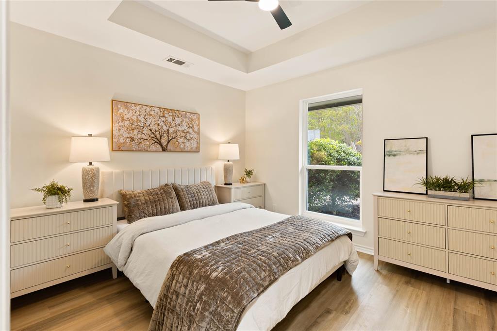 2850 Oak Tree Lane Midlothian, TX 76065 - Photo 22 of 40 a bedroom with a large bed and a dresser