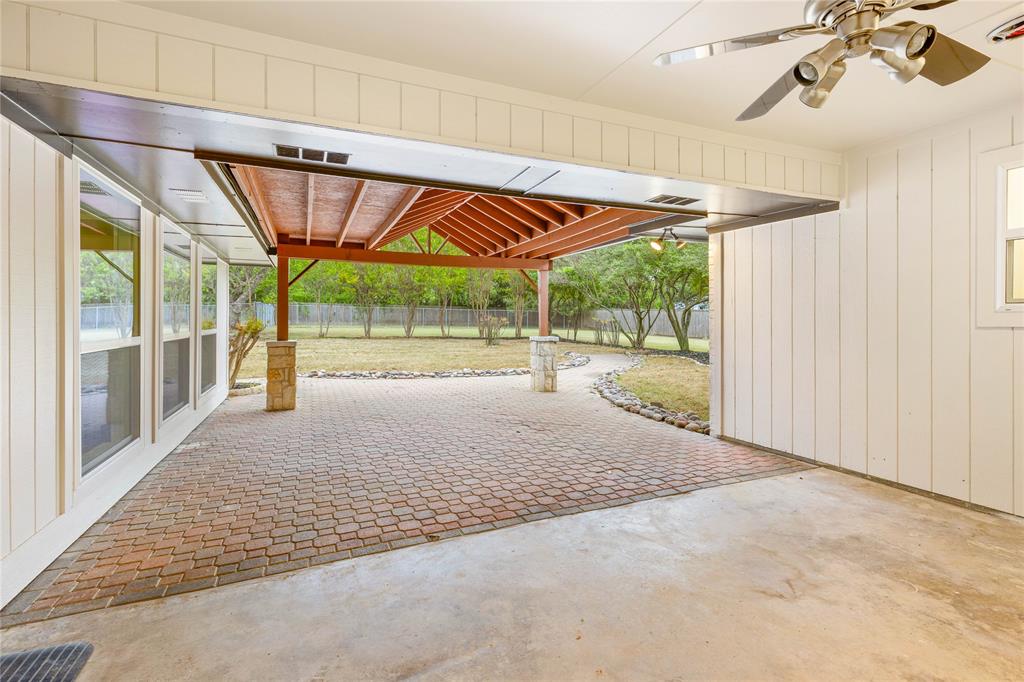 2850 Oak Tree Lane Midlothian, TX 76065 - Photo 31 of 40 a view of a porch with wooden floor and outdoor space