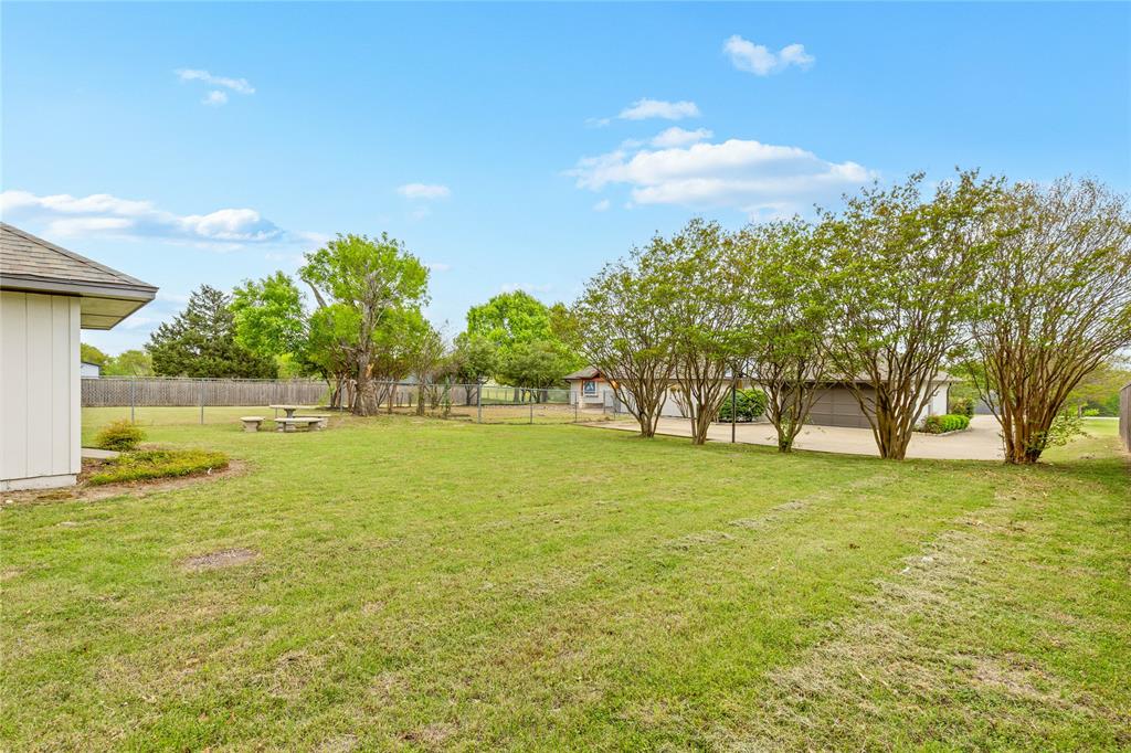 2850 Oak Tree Lane Midlothian, TX 76065 - Photo 38 of 40 a view of yard with swimming pool and green space