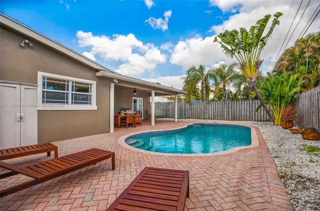 a front view of house with outdoor space