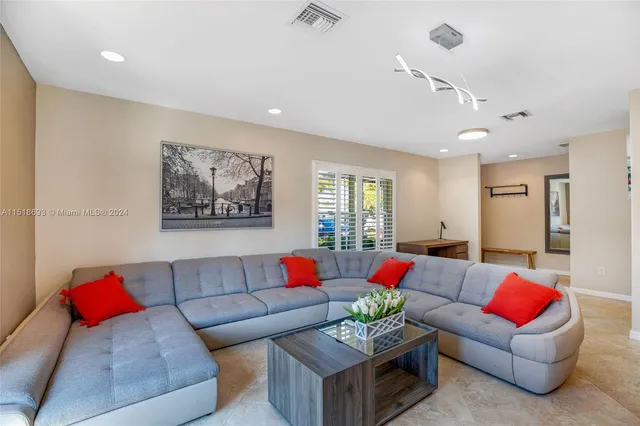 a living room with furniture and a couch