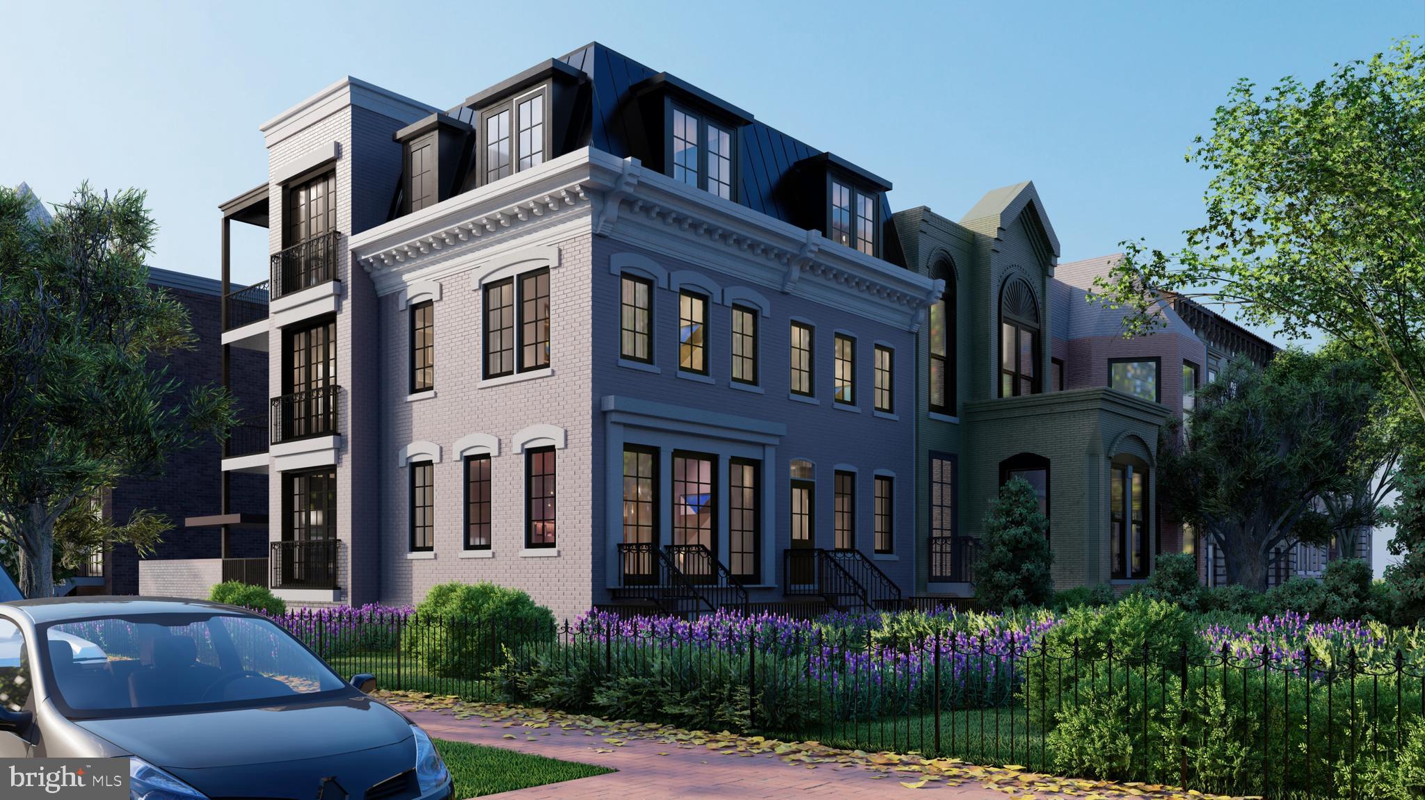 1902 16th Street Northwest Washington, DC 20009 - Photo 2 of 7 a front view of a house with yard and green space