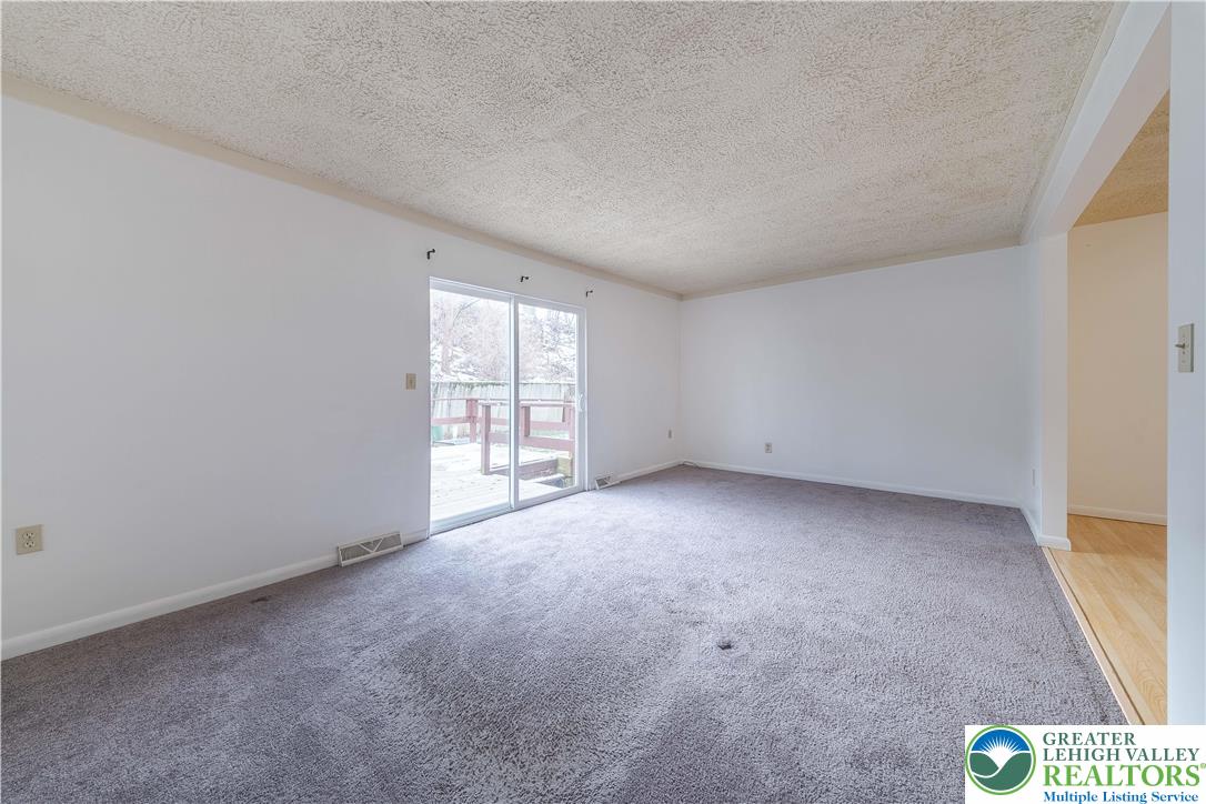 7528 Buttercup Road Lower Macungie Township, PA 18062 - Photo 14 of 30 a view of an empty room with a window