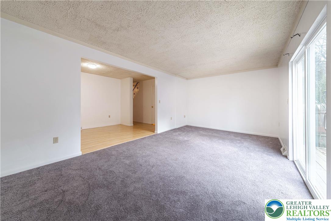 7528 Buttercup Road Lower Macungie Township, PA 18062 - Photo 15 of 30 an empty room with windows