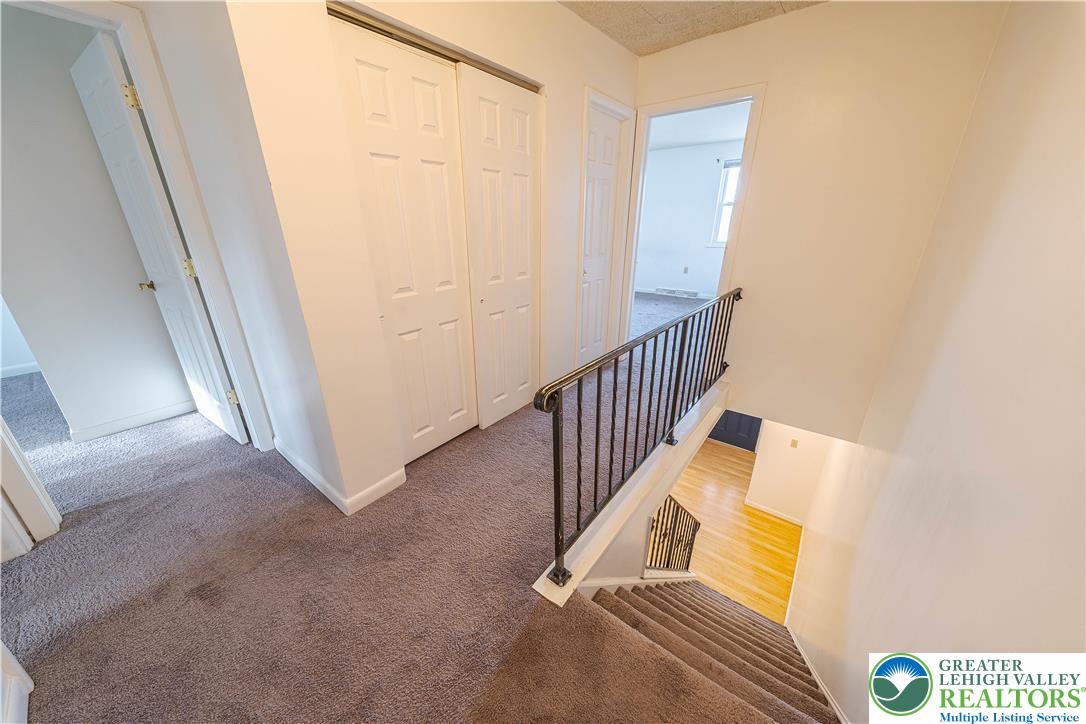 7528 Buttercup Road Lower Macungie Township, PA 18062 - Photo 17 of 30 a view of a staircase