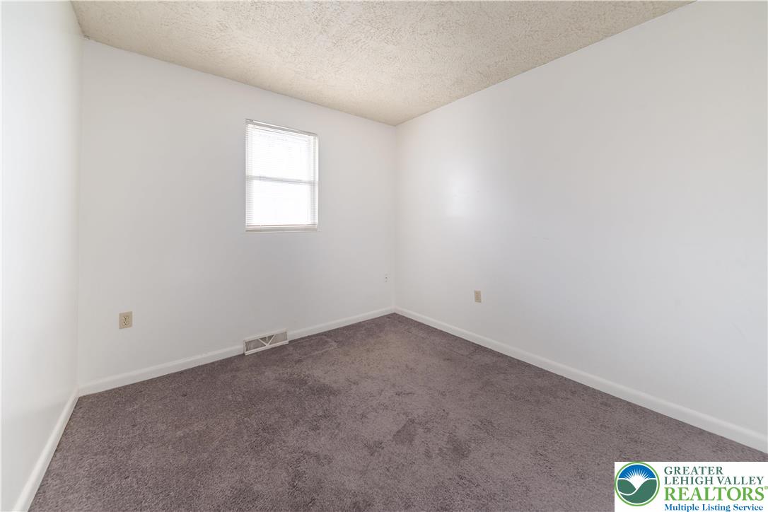 7528 Buttercup Road Lower Macungie Township, PA 18062 - Photo 23 of 30 an empty room with a window