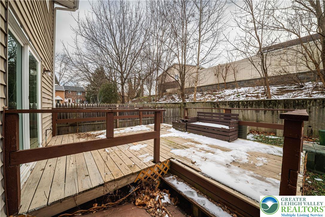7528 Buttercup Road Lower Macungie Township, PA 18062 - Photo 29 of 30 a view of a roof deck with two couches and wooden fence