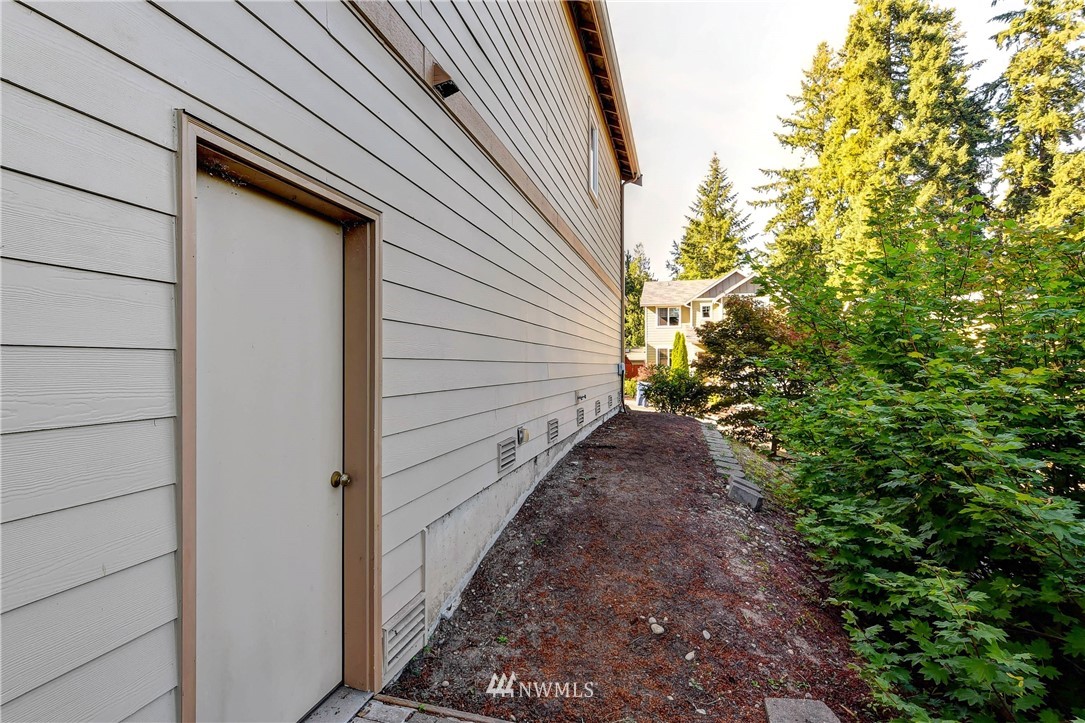 214 159th Street Southeast Bothell, WA 98012 - Photo 22 of 26 a view of a backyard with pathway