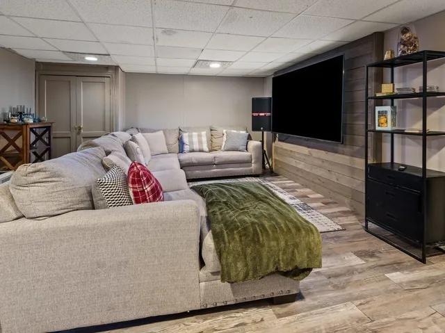 a kitchen with stainless steel appliances granite countertop a stove a refrigerator and a sink