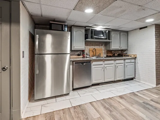 a front view of a house with a garage