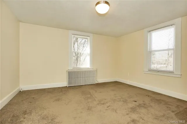 an empty room with a door