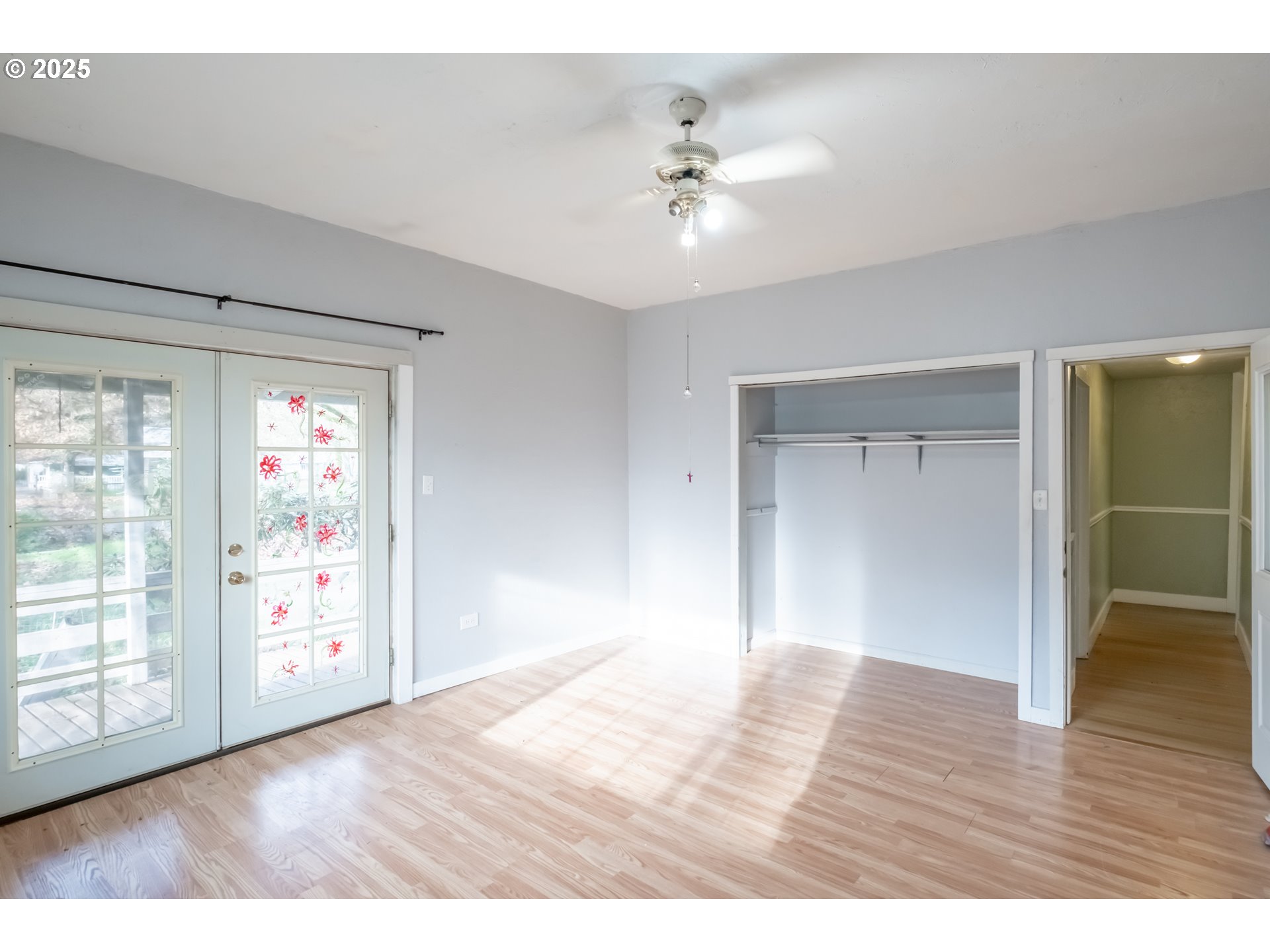 96470 Highway 99 Junction City, OR 97448 - Photo 16 of 48 a view interior of a house wooden floor and chandelier fan