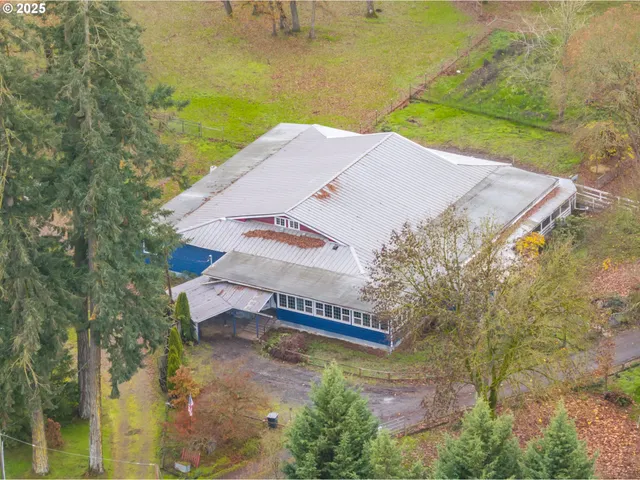 a view of a swimming pool with an outdoor space and seating area