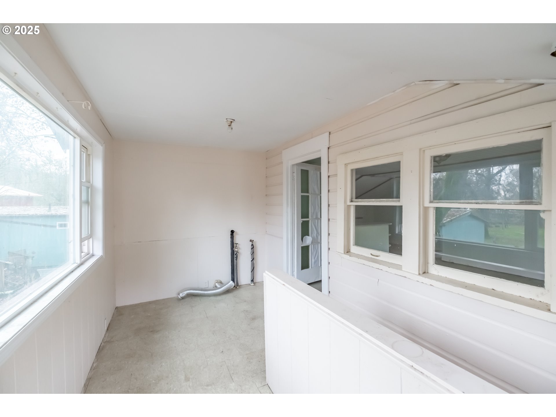 96470 Highway 99 Junction City, OR 97448 - Photo 33 of 48 a view of an empty room with a window