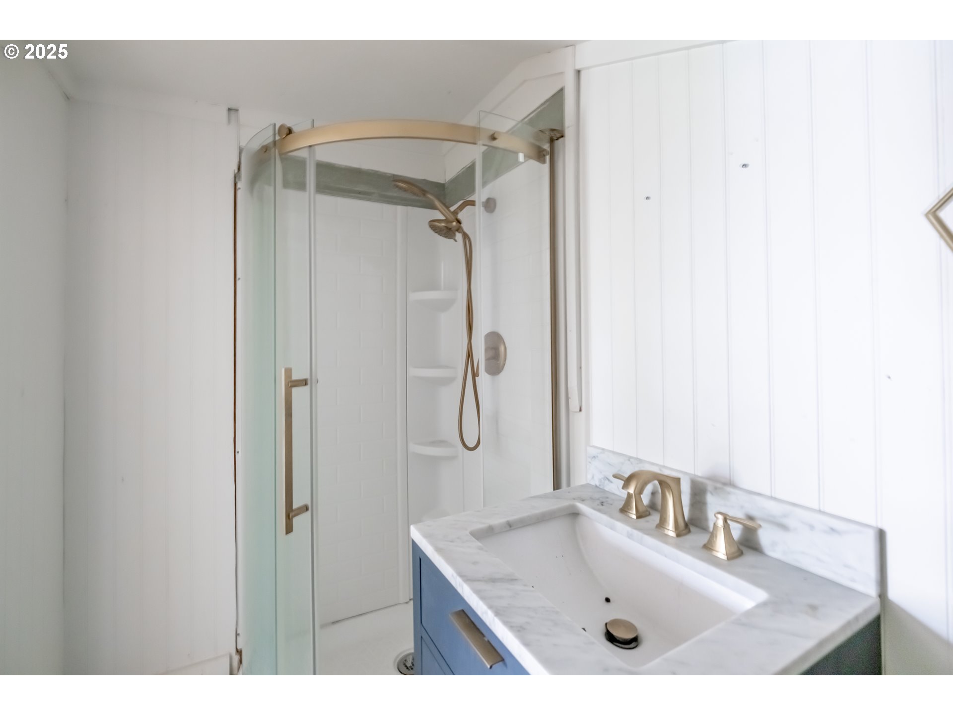 96470 Highway 99 Junction City, OR 97448 - Photo 35 of 48 a bathroom with a sink vanity granite tub shower and mirror