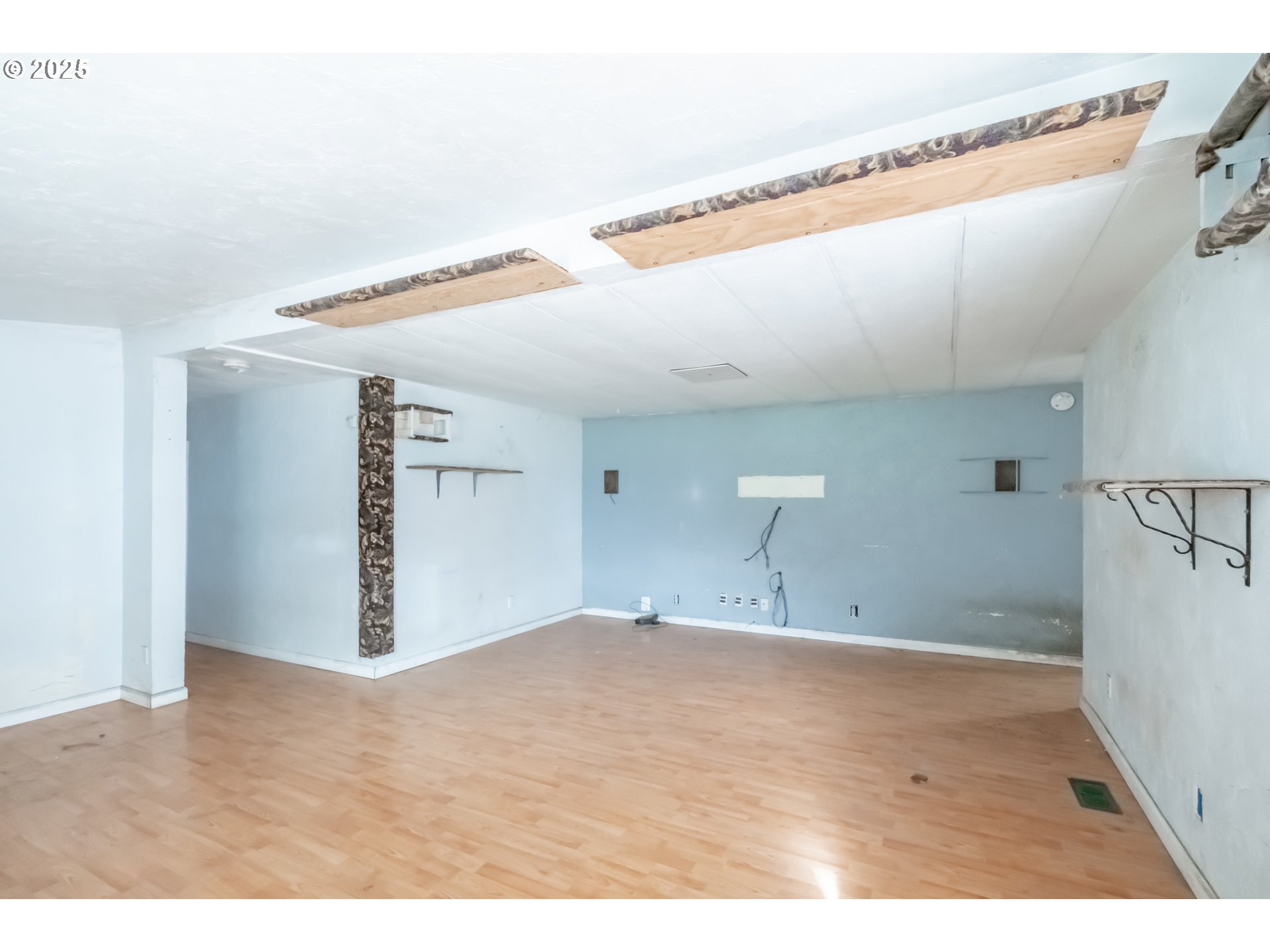 96470 Highway 99 Junction City, OR 97448 - Photo 39 of 48 a view of empty room with wooden floor