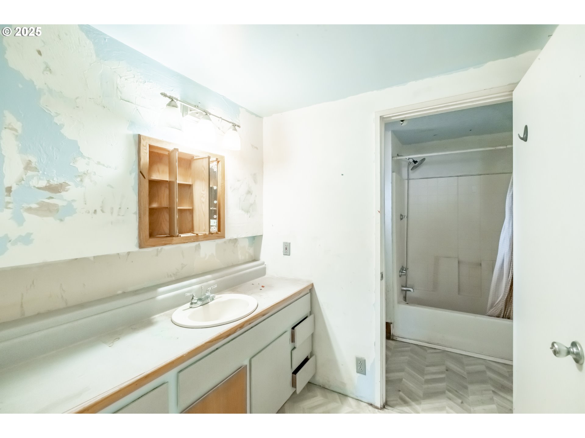 96470 Highway 99 Junction City, OR 97448 - Photo 45 of 48 a bathroom with a sink a mirror and a shower